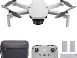 DJI Mini 2 SE Fly More Combo Drone - фото 1