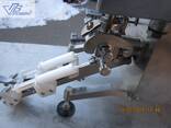 Дозатор шприцов с модернизированным ложементом и механизмом отсоса капли - photo 3