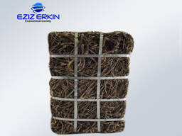 Корни и корневища солодки, резанные мелкими кусочками.