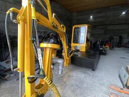 Миниземснаряд экскаватор