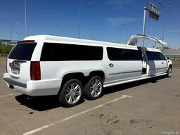 Прокат. Компания "7zvezd". Белый лимузин Cadillac Escalade