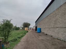 Промышленная база - 0, 72 га. 2 строения общей площадью 1465 м2